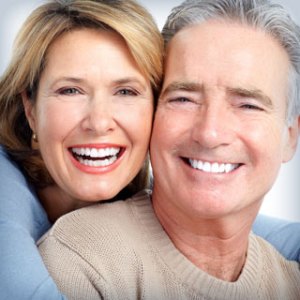 Photo of smiling, middle-aged couple